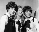 Three members of the Shangri-Las are seen on a visit to London in 1964, with Mary Weiss pictured in between twins Marge and Mary Anne Ganser.
