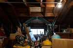 An old Portland Parks and Recreation sign hangs in the attic storage space at the Sellwood Community House in Portland, Ore., on May 15, 2026. The former public community center that nearly closed in 2019 is now run by the Sellwood Community House nonprofit.