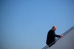 President Trump boards Air Force One after speaking to reporters on Wednesday.
