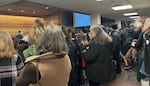 A packed Harris Hall where members of the public called on county commissioners to pass a public statement supporting transgender, immigrant and refugee communities on Feb. 25, 2025.