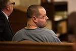 Jeremy Christian listens during a hearing in a Multnomah County courtroom in Portland, Ore., on Friday, May 3, 2019. Christian was in court seeking a delay in the beginning of his trial while the state considers changes to its death penalty law.