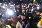 Members of the public gather to celebrate the New Year during the annual bell-tolling ceremony at the Bosingak Pavilion on January 01, 2026 in Seoul, South Korea.