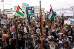 Houthi supporters chant slogans during a weekly, anti-U.S. and anti-Israel rally in Sanaa, Yemen on Friday, April 18.