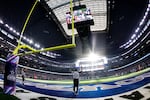 Long field goals, like this 50-yarder by Dallas Cowboys kicker Brandon Aubrey in October, were once rare in the NFL. This season, they're happening at a record pace.