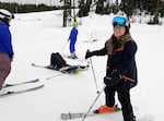 Participants of Open Slopes PDX receive ski lessons on Mount Hood in March 2022. The grassroots group aims to get people of color involved in winter sports.