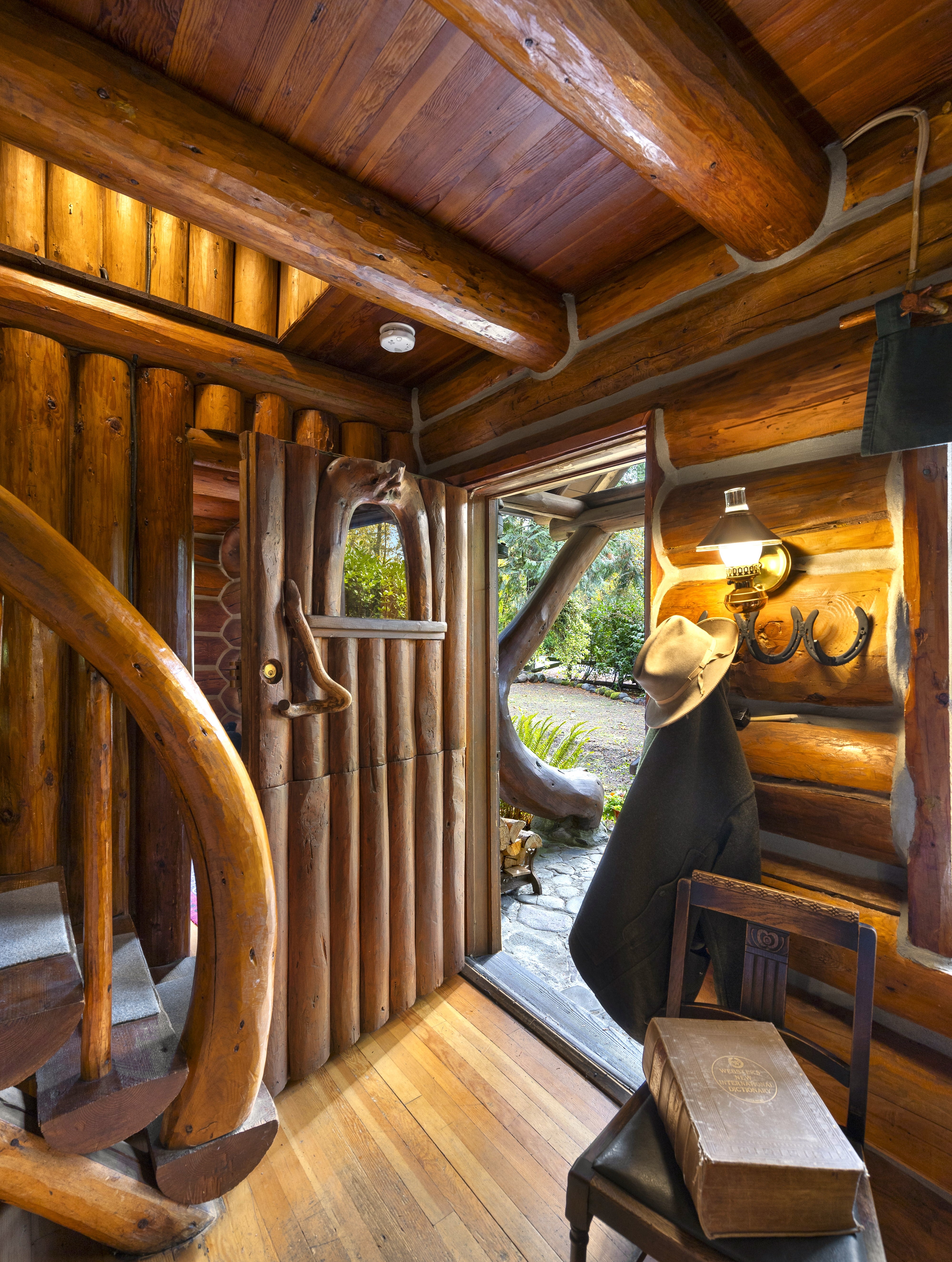 Each Steiner cabin is one-of-a-kind, yet unmistakably shares the enchanting Steiner signature style, with features such as stair banisters made from curved logs and whimsical porch posts made from crooked tree trunks, as seen in this photo taken in September 2024.