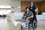 Mohammad Fawad Mohammadi is wheeled out of Legacy Emanuel Medical Center on Thursday after five weeks in recovery from a brutal attack that claimed his right leg.  