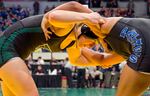 Tigard High School junior Natalie Wilhoit, left, grapples with her opponent, Leilarose Calva of South Medford High School, during the OSAA Wrestling State Championships on Feb. 24, 2024. Wilhoit ultimately won the bout in the third period.