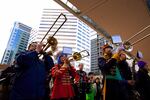 The Unpresidented Brass Band play at the March for Impeachment in downtown Portland.