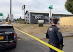 Portland Police officers are on the scene of a “critical incident” in Southeast Portland, Sept. 24, 2026. The area surrounding the Chestnut Tree Inn is cordoned off by police tape.