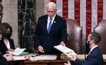 Proposed changes to the Electoral Count Act would clarify the vice president's role in counting states' electoral votes. Here, then-Vice President Mike Pence is seen in the House chamber early on Jan. 7, 2021, to finish the work of the Electoral College after a mob loyal to President Donald Trump stormed the Capitol.