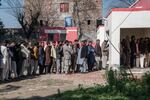 Pakistan voters queue to cast their ballots at a polling station in Pakistan's general election on Feb. 8, in Wahgrian, Pakistan. The elections have direct implications for Pakistan's global credibility, particularly in strategic and economic relationships.
