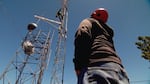 Chief engineers Max Culbertson and Roger Domingues inspecting the tower at Table Rock.