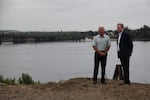 Developer Barry Cain (left) with designer Larry Kirkland, who created a cable-suspension pier to crown the design of The Waterfront.