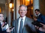 Sen. Tommy Tuberville, R-Ala., speaks to reporters outside the Senate chamber in the Capitol on Thursday,.