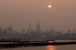 Buildings in the Manhattan skyline shrouded in smoke from Canada wildfires at sunrise in Jersey City, New Jersey, on Weds., June 7, 2023. New York was the most polluted major city in the world on Tuesday night, as smoke from Canadian wildfires blanketed the city in haze.