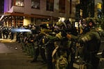 FILE - Federal police try to take control of the streets during protests, Sept. 18, 2020, in Portland, Ore. The protests, which began over the killing of George Floyd, often result frequent clashes between protesters and law enforcement.