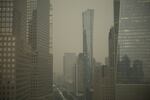 Buildings in lower Manhattan in New York are partially obscured by smoke from Canadian wildfires on Tuesday, June 6, 2023.