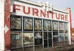 As part of the effort to remake the neighborhoods along 82nd Avenue, community groups plan to turn this old furniture store into a community center and affordable housing. 