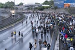 Protesters marching against racist violence and police brutality block traffic on Highway 84 in NE Portland on June 8, 2020. 