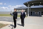 U.S. Rep. Cheri Bustos, D-Ill., and Sen. Dick Durbin, D-Ill., speak in front of U.S. Penitentiary, Thomson on Aug. 18, 2017.