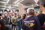 Terry Muriekes (center), a tool-storage worker at Boeing's factory in Everett, Wash., for 38 years, holds a sign during a strike rally for the International Association of Machinists and Aerospace Workers (IAM) at a union hall in Seattle on Tuesday.