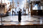 Inside the Church of the Nativity. The church is typically packed with visitors each December. But now, it's nearly empty.