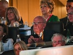 Rupert Murdoch, center, at the Republican National Convention in July. Murdoch has led his media empire to become a major player in conservative politics.