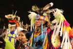 Native American and Indigenous dancers pack an arena during a grand entry procession at the annual Gathering of Nations powwow in Albuquerque, New Mexico, Friday, April 25, 2025. The Oregon Tribal Student Grant supports Indigenous students, expanding opportunities despite federal pushback against diversity efforts, and has been transformative for many amid historically low college-going rates.