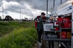 United States Environmental Protection Agency crews work near a ditch on May 26, 2026. The ditch was contaminated and located across the street from Nippon Dynawave Packaging Co.