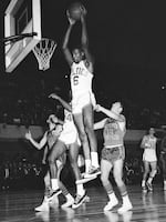 Russell soars to grab a rebound against the Detroit Pistons in 1961. Russell revolutionized basketball with his high-flying defense and prolific shot-blocking. "Basically what I was doing," he said, "was bringing the vertical game to a game that had been horizontal."