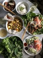 One of food journalist Samantha Bakall's favorite Vietnamese restaurants in Portland is Mehka Noodle. Pictured here is the mi quang — a turmeric-infused seafood and pork soup from Central Vietnam —  lettuce wraps, and bun cha Hanoi.