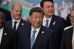 China's President Xi Jinping gathers for the world leaders' group photo at the G20 Summit, in Rio de Janeiro, Tuesday, Nov. 19, 2024.