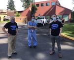 The city of Woodburn, Ore., thanked it's first responders and healthcare workers on Wednesday, May 13, 2020. From left: Woodburn Mayor Eric Swenson, Salud doctor Mania Kupershtok and Salud director Antonio Germann.