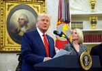 President Trump speaks alongside Attorney General Pam Bondi during her swearing in ceremony at the White House on Feb. 5.