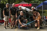 A group at the Yakima tent posed with their Star Wars themed machine. They made it down the mountain twice without crashing. The ship was designed to squirt water at the crowd.
