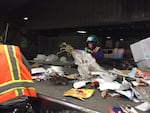 Workers at the FarWest recycling facility in Hillsboro, Oregon, pull out contaminants like plastic and rope from the recycling that people put in their curbside recycling bins.