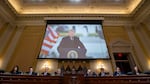 Former President Donald Trump is displayed on a screen during a meeting of the Select Committee to Investigate the Jan. 6 Attack on the U.S. Capitol on Monday.