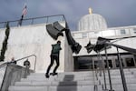 FILE - People enter the Oregon State Capitol in Salem, Ore. on Feb. 2, 2026.