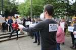 Full-time PSU student Owen Christofferson rallies a crowd of ride-hailing drivers outside Portland City Hall.
He say Uber and Lyft have gradually reduced his wages. He now makes about minimum wage, despite working 15 to 40 hours a week.