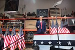 Republican presidential candidate and former President Donald Trump arrives for a campaign stop at Drake Enterprises, an automotive parts manufacturer, on September 27, 2023 in Clinton Township, Mich.