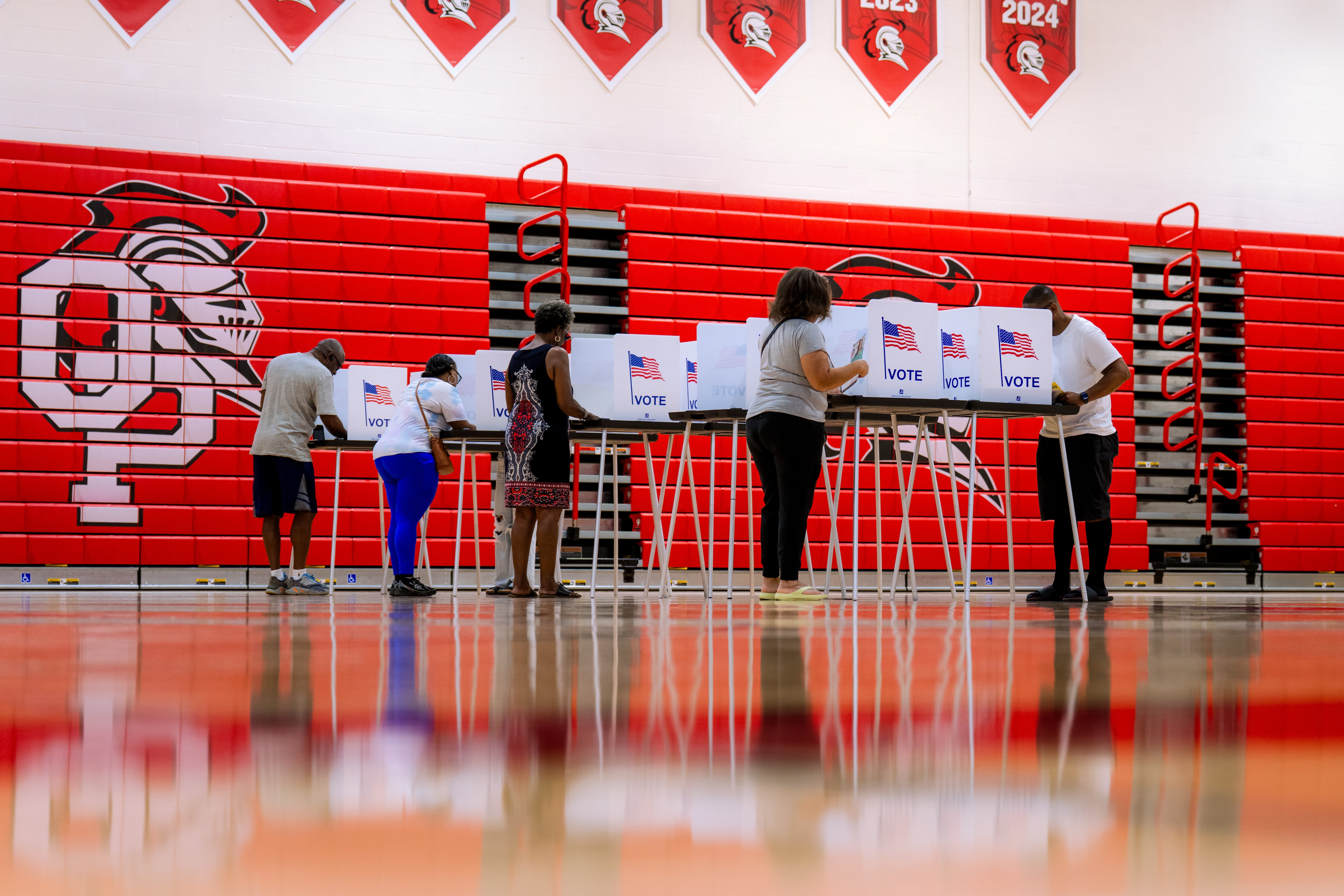 People vote in the primary election at Oak Park High School in Oak Park, Mich., Tuesday, Aug. 4, 2026.