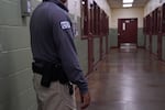 A security guard poses during a media tour of the Port Isabel Detention Center hosted by ICE in Los Fresnos, Texas in 2024. The Trump administration seeks to reopen family detention centers in the state.