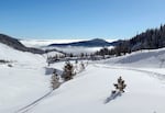 File photo from Jan. 16, 2024. Ski patrollers do more then provide emergency aid on the slopes. They often are responsible for risk management on the mountain, looking at snow pack, documenting the scene of accidents and more. 