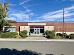 A man enters the Grants Pass School District 7 Administration Building on September 9, 2024.