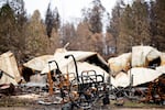 FILE - Scorched wheelchairs rest outside Cypress Meadows Post-Acute, a nursing home leveled by the Camp Fire on Dec. 4, 2018, in Paradise, Calif. The staff was able to safely evacuate all 91 patients.