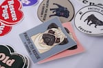 Stickers are laid out on a table. Pugapalooza was part of the Portland Saturday Market, and was held in partnership with local nonprofit Pacific Pug Rescue. 