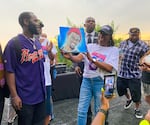 RowVaughn Wells holds up a portrait of her son, Tyre Nichols, at a celebration for what would be his 30th birthday on June 5 2023.