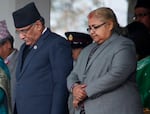 Nepal's then-chief Justice of the Supreme Court, Sushila Karki (right), observes a minute's silence during Democracy Day in Kathmandu, Nepal, Feb. 18, 2017.
