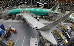 A 737 Max 8 undergoes final assembly inside Boeing's factory in Renton, Wash., on March 27, 2019. Kansas-based Spirit AeroSystems makes the fuselages and ships them to Washington. A series of production issues at Spirit have led to problems.